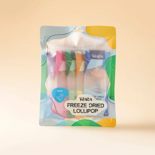 A package of Waita Freeze Dried Lollipop ice dried pop, featuring four colorful lollipops visible through a clear window in a pastel-colored stand-up pouch.
